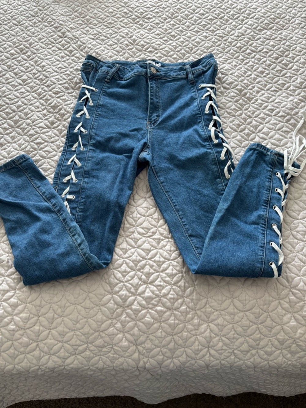 Rue21 Blue Skinny Jeans with White Lace-Up Side Panels